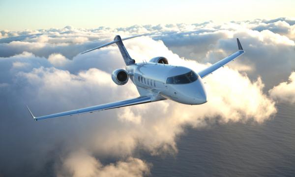 The Bombardier Challenger 300 is a super-mid-sized jet capable of traveling transcontinental distances. All of the passenger seats are fully adjustable and have fold-out tables and individual AC power plugs. Two-zone air conditioning keeps both the pilots and the passengers comfortable, and low-heat LED overhead lights (with a 10,000-hour life) give the cabin an open feel.